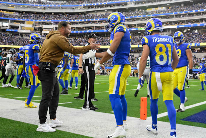 Nov 19, 2023; Inglewood, California, USA; Los Angeles Rams wide receiver Puka Nacua (17) celebrates with head coach Sean McVay after scoring a touchdown in the second quarter against the Seattle Seahawks at SoFi Stadium. Mandatory Credit: Robert Hanashiro-USA TODAY Sports